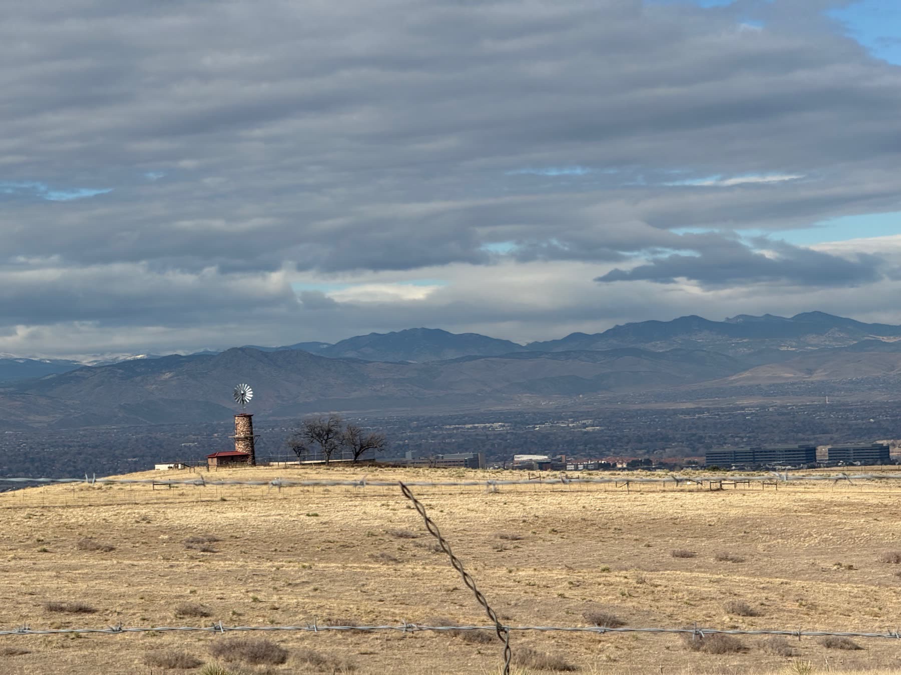 Highlands Ranch landscape with the Front Range and windmill